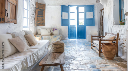 Whitewashed walls, blue accents, natural stone floors, and simple wooden furniture, evoking the charm of a Greek island retreat.
