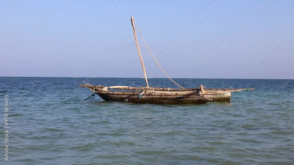A traditional Boat at Diani Beach - Galu Beach - Kenya, Africa A traditional Boat at Diani Beach - Galu Beach - Kenya, Africa
