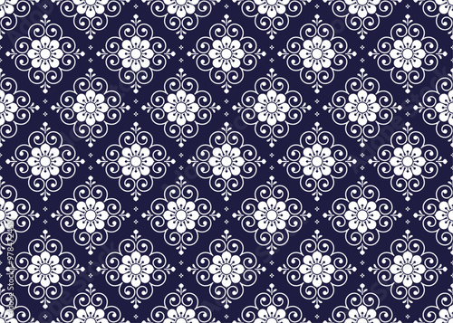 White symbol floral on dark blue background, ethnic fabric seamless pattern, design for cloth, carpet, batik, wallpaper, wrapping etc.