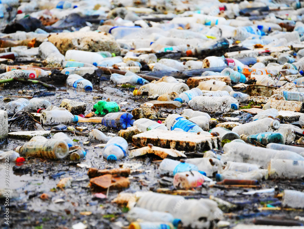 impactful image of plastic waste pollution in nature, featuring discarded bottles and debris contaminating the environment, pollution, plastic pollution and its detrimental effects on ecosystems impactful image of plastic waste pollution in nature, featuring discarded bottles and debris contaminating the environment, pollution, plastic pollution and its detrimental effects on ecosystems