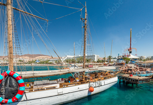 Marina with moored yachts and pleasured boats at the tourist resort located o...