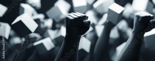 A striking monochrome image of raised fists amidst floating cubes, symbolizing unity, strength, and empowerment. photo