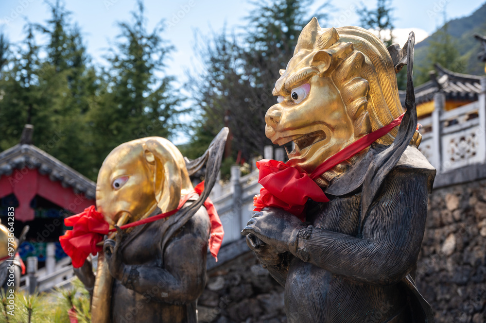 Obraz premium The bronze statues with animal head situated in Jade water village in Lijiang, China.