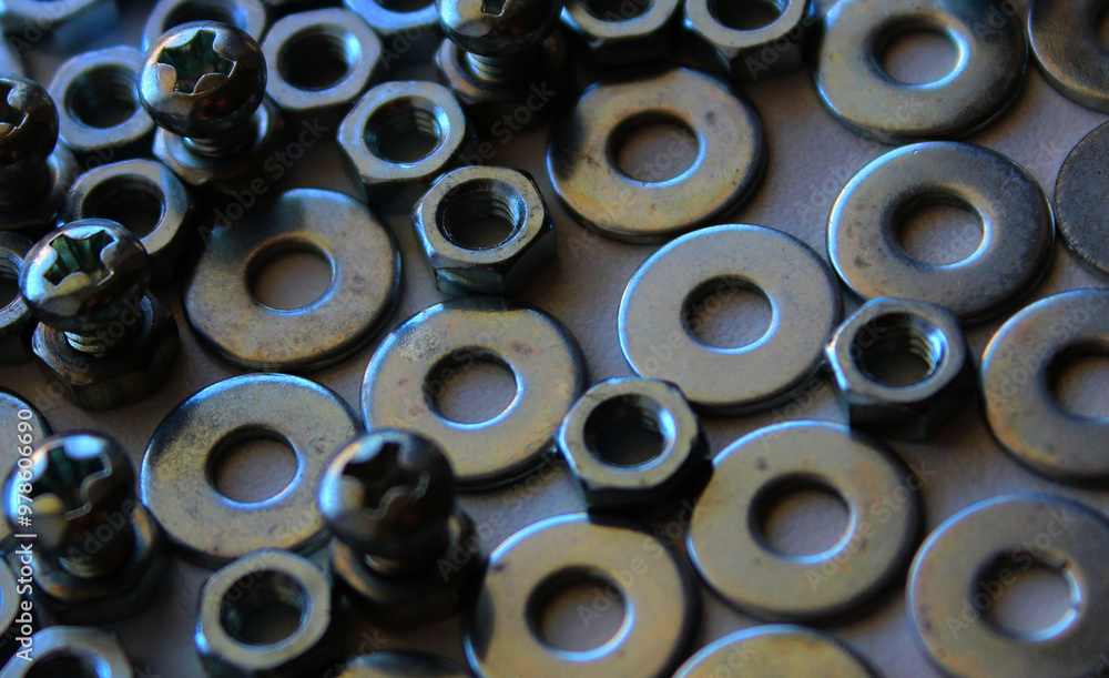 Shiny Bolts, Nuts And Washers Laid Out Side By Side On White Surface Macro Shot Stock Photo Shiny Bolts, Nuts And Washers Laid Out Side By Side On White Surface Macro Shot Stock Photo