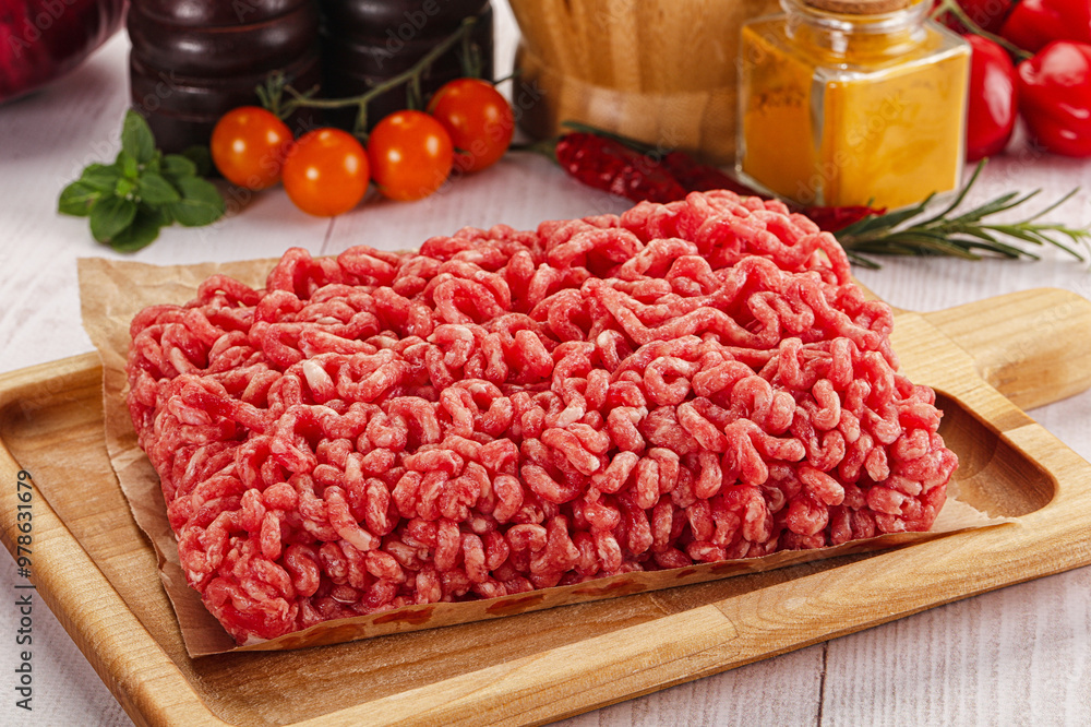 Raw minced beef meat over board Raw minced beef meat over board