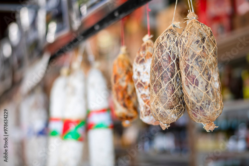 Dried meats hanging in an Italian deli in San Francisco Little I photo