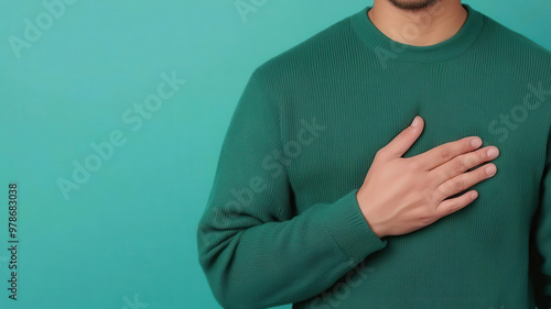 Person holding a hand to their chest, Chest Tightness, showcasing physical symptoms like somatic pain linked to depression