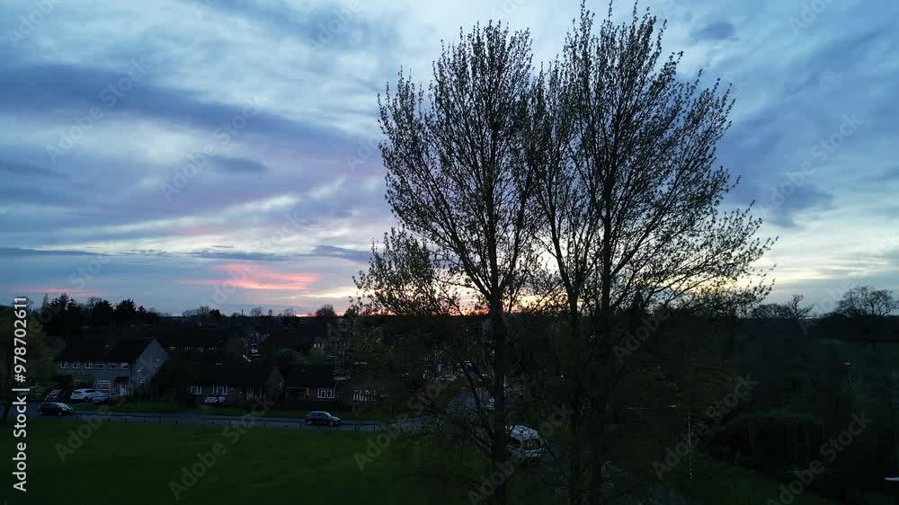 High Angle View of Central City of Harefield, Uxbridge, London United Kingdom. Footage Captured with Drone's Camera During Beautiful Sunset Time on April 3rd, 2024 High Angle View of Central City of Harefield, Uxbridge, London United Kingdom. Footage Captured with Drone's Camera During Beautiful Sunset Time on April 3rd, 2024