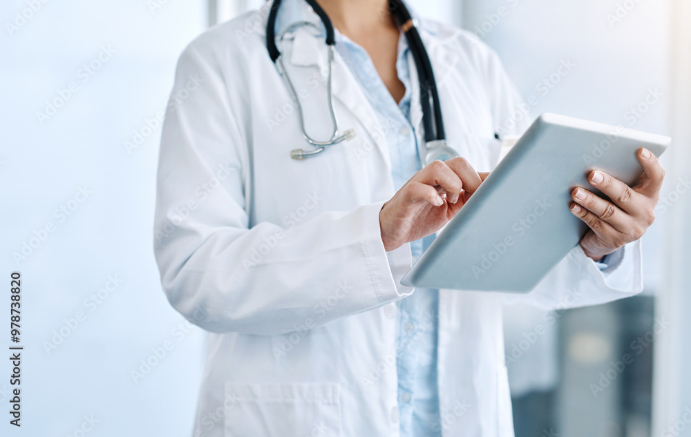 Woman, doctor and hands with tablet for medical research, telehealth or service at hospital. Closeup, female person or healthcare employee scrolling or browsing on technology for online consultation Woman, doctor and hands with tablet for medical research, telehealth or service at hospital. Closeup, female person or healthcare employee scrolling or browsing on technology for online consultation