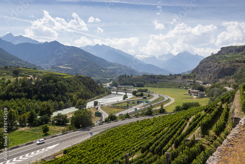 View of the Aosta Valley and Dora Baltea River from Sarre near Aosta in Italy. The valley is a major transport route, and connects Italy with the Mont Blanc tunnel and France.