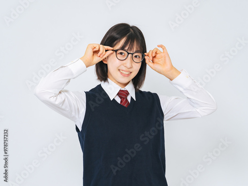 制服を着て眼鏡をかけた女子学生のポートレート photo