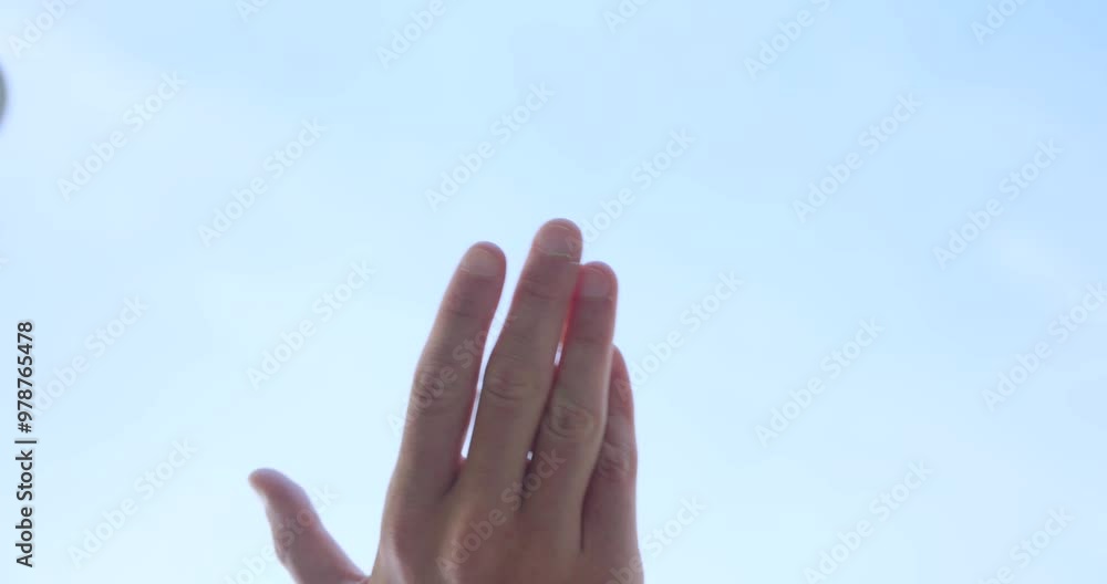 Neo quadcopter drone flying off from palm of hand, low angle view Neo quadcopter drone flying off from palm of hand, low angle view