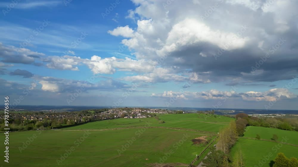 High Angle View of British Agricultural Farms at Countryside and Beautiful Landscape of Near Hills of Rotherham, England Great Britain of UK. April 30th, 2024 High Angle View of British Agricultural Farms at Countryside and Beautiful Landscape of Near Hills of Rotherham, England Great Britain of UK. April 30th, 2024