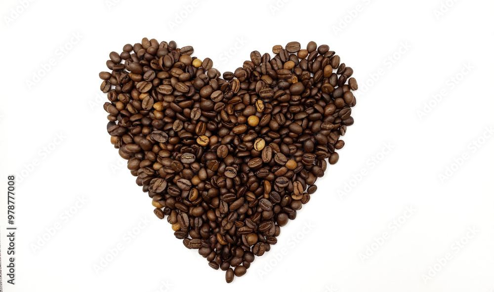 heart made of roasted natural coffee beans on a white background heart made of roasted natural coffee beans on a white background