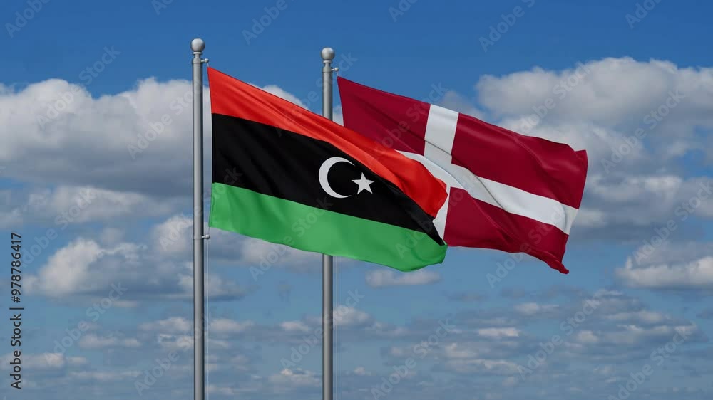 Denmark and Libya flags flying together, video concept of the relationship, two country relations concept Denmark and Libya flags flying together, video concept of the relationship, two country relations concept