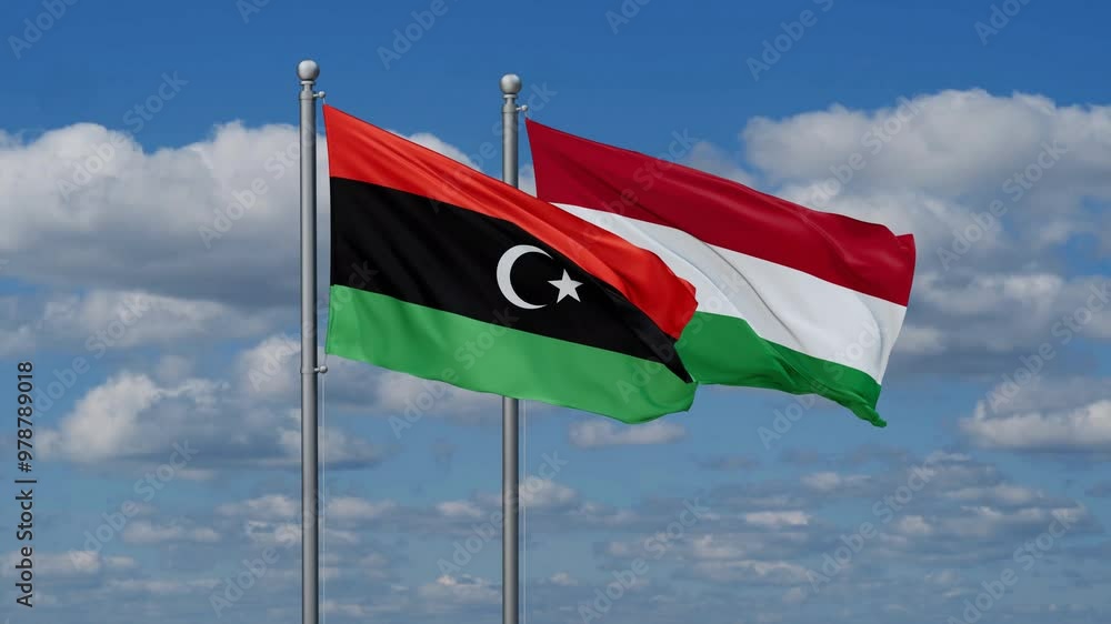 Hungary and Libya flags flying together, video concept of the relationship, two country relations concept Hungary and Libya flags flying together, video concept of the relationship, two country relations concept