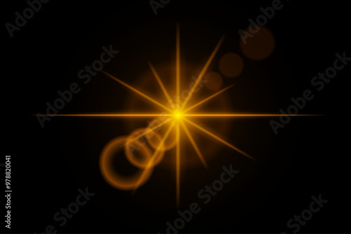 Yellow neon stripes or light flash star. Laser beams, horizontal beams. Beautiful light reflections. Glowing stripes on a black background.