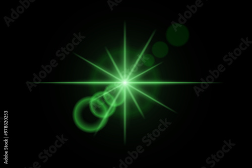 Green neon stripes or light flash star. Laser beams, horizontal beams. Beautiful light reflections. Glowing stripes on a black background.