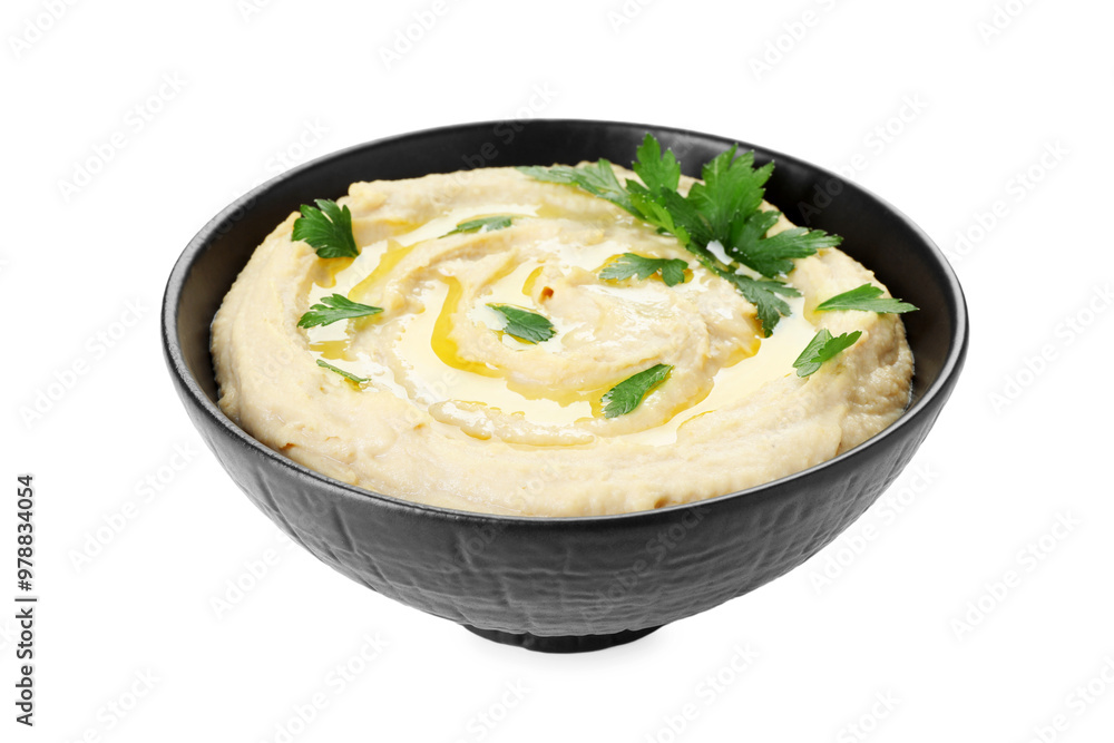 Delicious hummus with olive oil and parsley isolated on white Delicious hummus with olive oil and parsley isolated on white