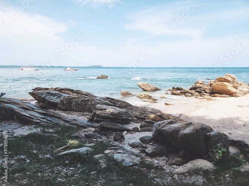 Rocks on the sandy beach of Koh Samet photo