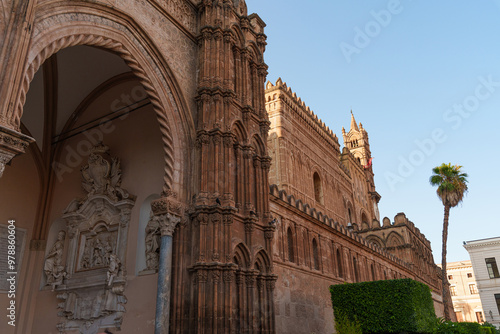 Close-up of the ornate facade and arched entrance of Palermo Cathedral in Sicily, highlighting its intricate Norman architecture and decorative elements