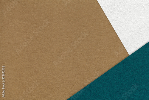 Texture of craft brown color paper background with white and emerald border. Vintage abstract umber cardboard. photo