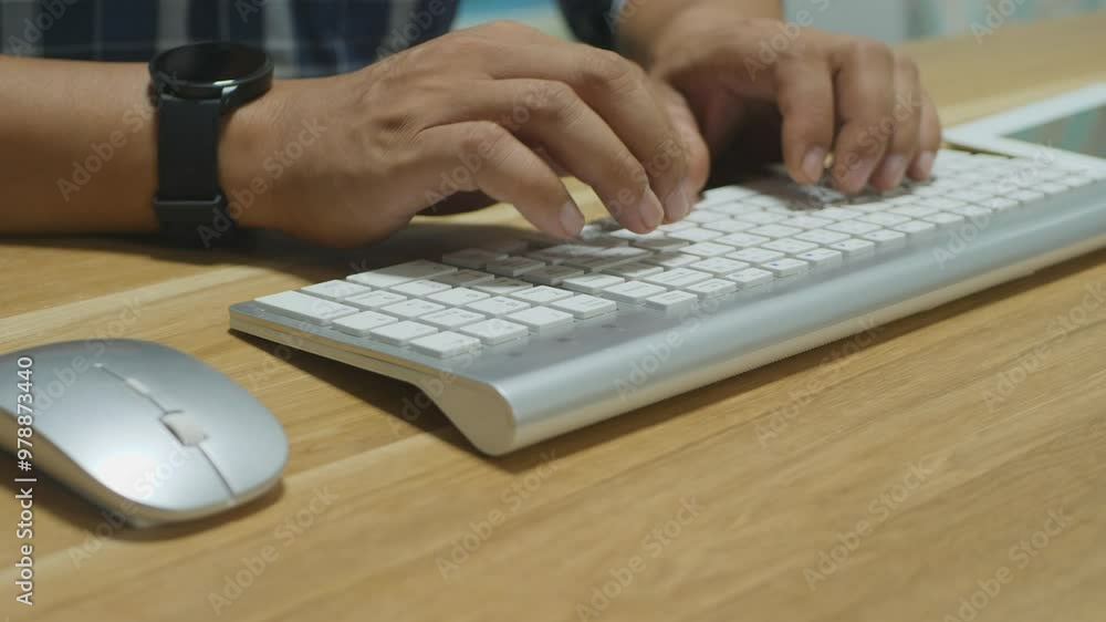 Businessman typing and using a tablet Businessman typing and using a tablet