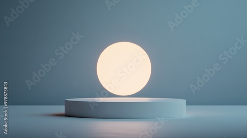 A glowing white orb rests on a sleek, circular pedestal against a soft blue backdrop, creating a serene minimalist aesthetic.