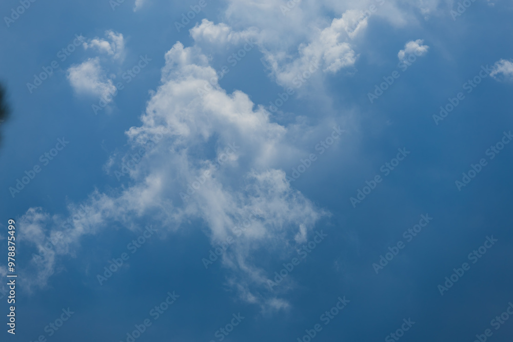 Blue sky and white and gray clouds. Texture background for design. Blue sky and white and gray clouds. Texture background for design.