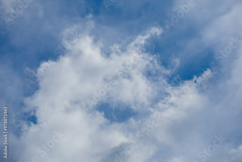 Blue sky and white and gray clouds. Texture background for design.