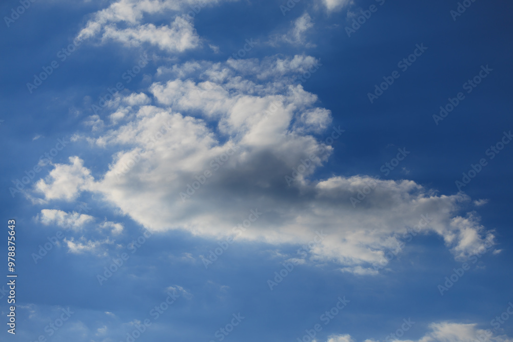 Blue sky and white and gray clouds. Texture background for design. Blue sky and white and gray clouds. Texture background for design.