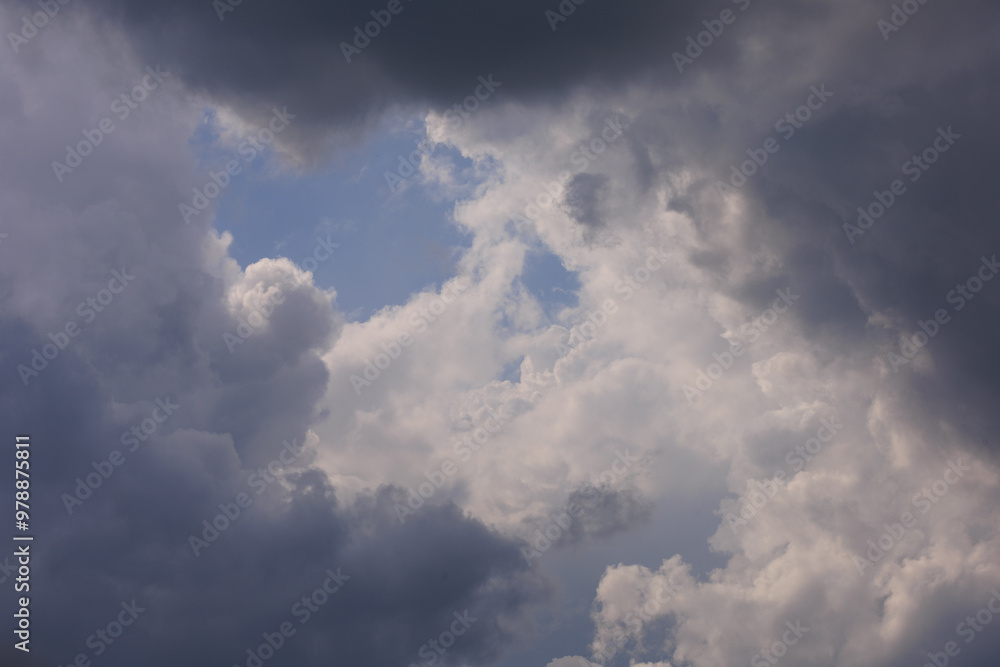Blue sky and white and gray clouds. Texture background for design. Blue sky and white and gray clouds. Texture background for design.