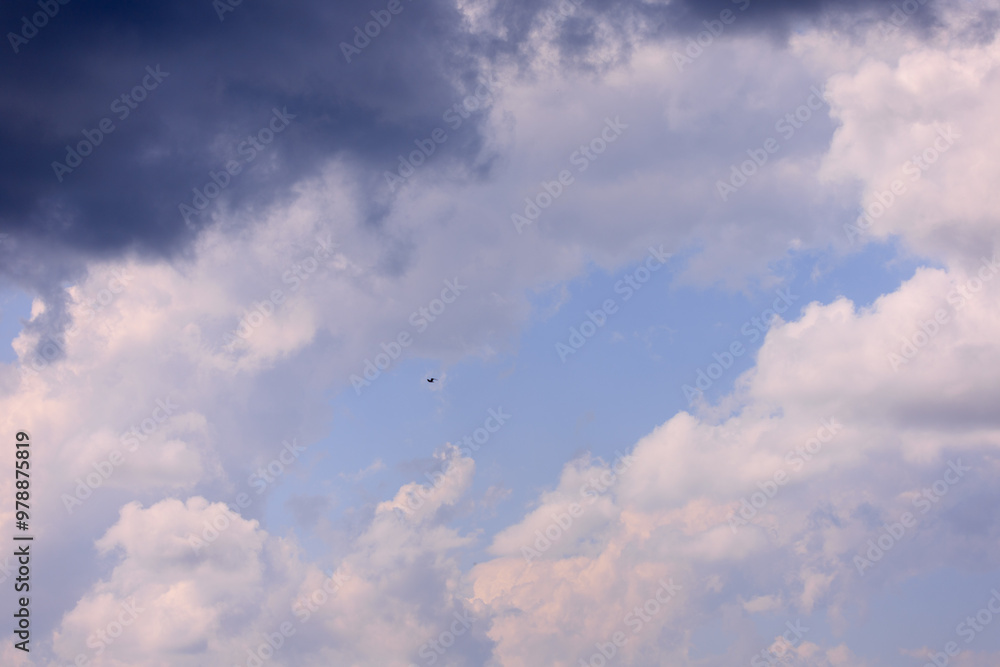 Blue sky and white and gray clouds. Texture background for design. Blue sky and white and gray clouds. Texture background for design.
