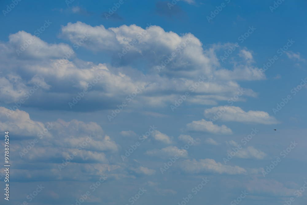 Blue sky and white and gray clouds. Texture background for design. Blue sky and white and gray clouds. Texture background for design.