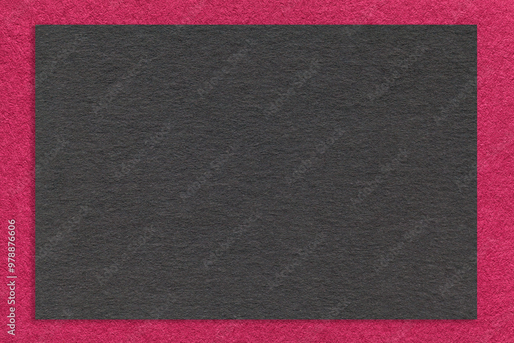 Fototapeta premium Texture craft black paper background with purple border, macro. Structure of vintage kraft magenta cardboard