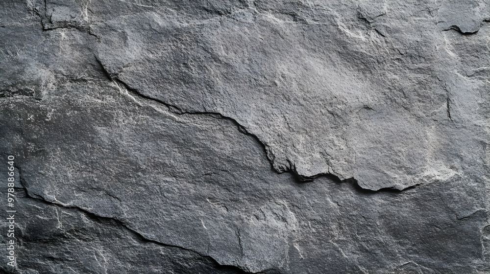 A Close-Up View of a Rough, Gray Stone Surface with Cracks and Texture A Close-Up View of a Rough, Gray Stone Surface with Cracks and Texture