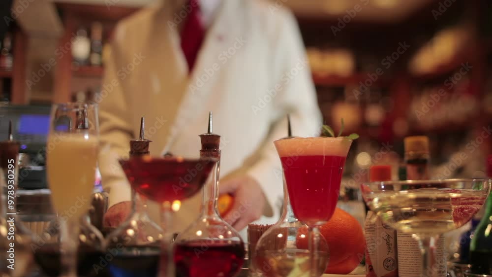 Stylish waiter in cocktail bar Stylish waiter in cocktail bar