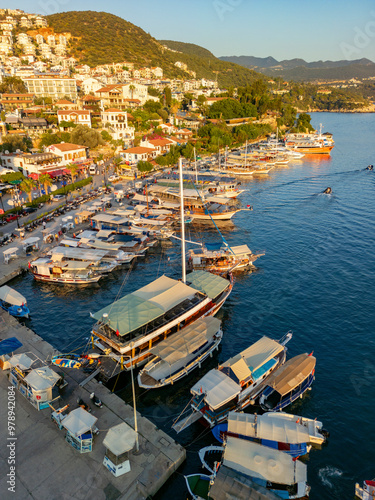 Aerial view of beautiful harbor with moored boats and scenic town, Kas, Turkey.