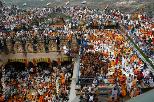 Aerial view of People from all over world gather for celebration of Mahamastakabhisheka head anointing ceremony of jain saint Gomateshwara lord Bahubali, Sravanabelagola, Karnataka, India