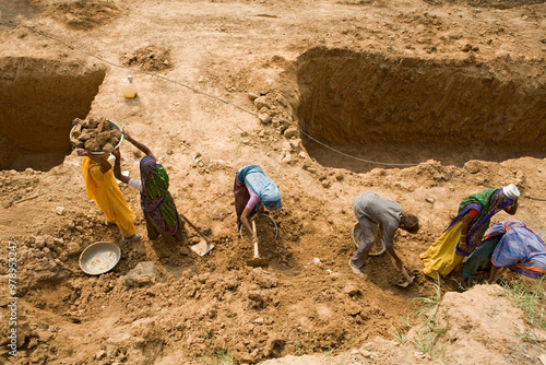 Aerial view of Workers at a construction site engaged in manual unskilled work, Ahmedabad, Gujarat, India