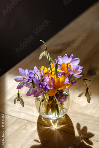Bouquet of purple crocus in vase. Spring flowers in a vase.