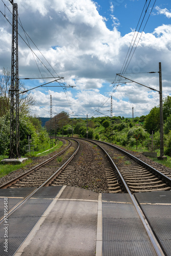 Railway outdoors on beautiful summer day. Industrial landscape with rails and railway.