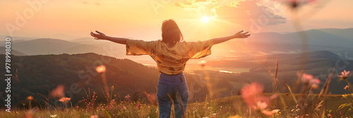 Embracing the Horizon: A Moment of Pure Freedom on a Sunlit Hilltop photo