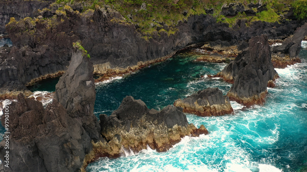 Aerial view of beautiful rugged cliffs and azure ocean waves, Norte Pequeno, Portugal. Aerial view of beautiful rugged cliffs and azure ocean waves, Norte Pequeno, Portugal.