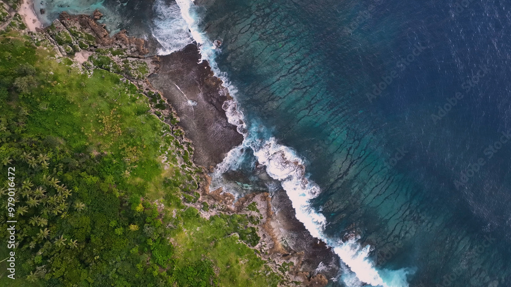 Aerial view of tropical island with lush greenery and beautiful reef, Utulau, Tonga. Aerial view of tropical island with lush greenery and beautiful reef, Utulau, Tonga.