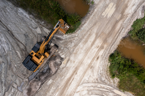 Aerial view of construction site with excavators and machinery in development, Fellsmere, United States. photo