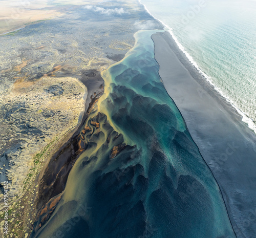 Aerial view of beautiful coastal landscape with clear ocean and scenic shore, Hvolsvollur, Iceland. photo