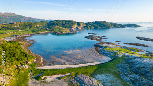 Aerial view of serene bay with rocky coastline and tranquil beach, Mjelle, Mulstrand, Buholmen, Norway. photo