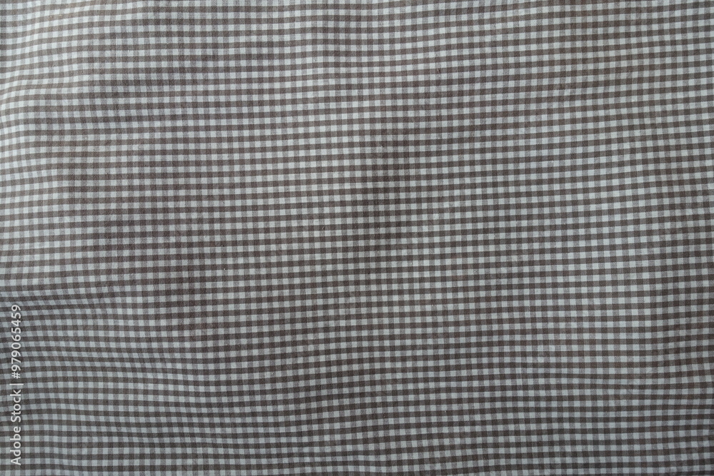 Surface of cotton fabric with grey and white gingham pattern Surface of cotton fabric with grey and white gingham pattern
