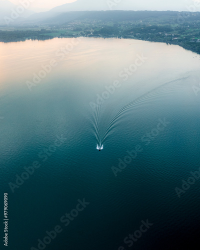 Aerial view of serene Viverone Lake with boats and reflections, Viverone, Italy. photo